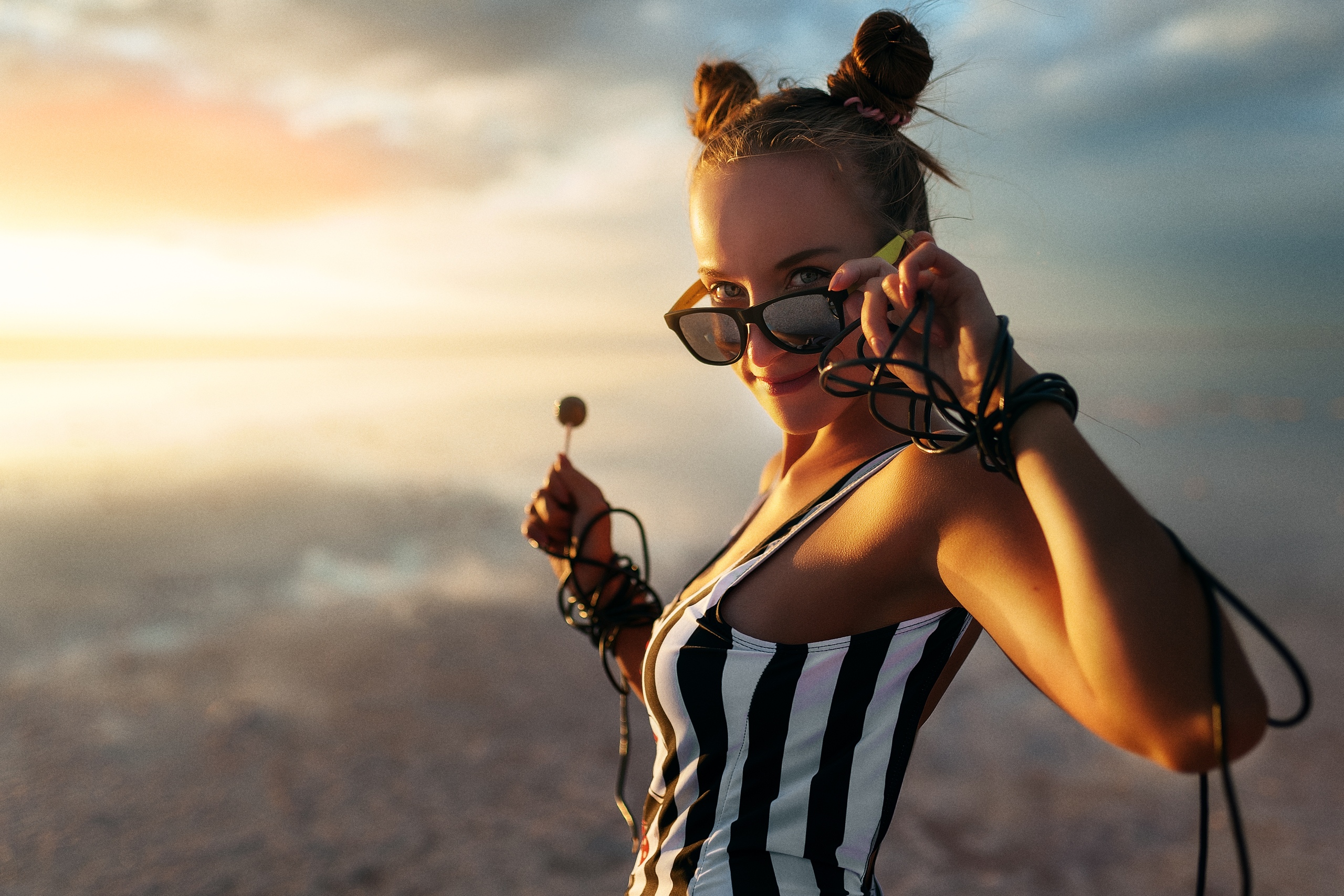 Wallpaper One Piece 92 women, model, hairbun, sunglasses, sunset, sky, clouds, looking at viewer, smiling, portrait, lollipop, depth of field, monokinis, one-piece swimsuit, swimwear, outdoors, women outdoors