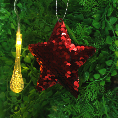 Colgante estrella navideño rojo/verde, 9x9cm, lentejuelas