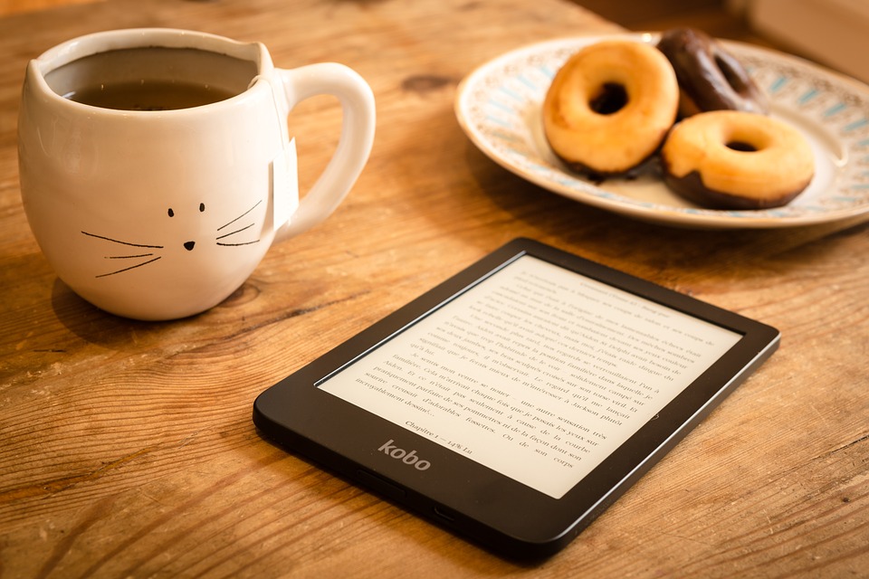 ebook with cat coffee and donuts