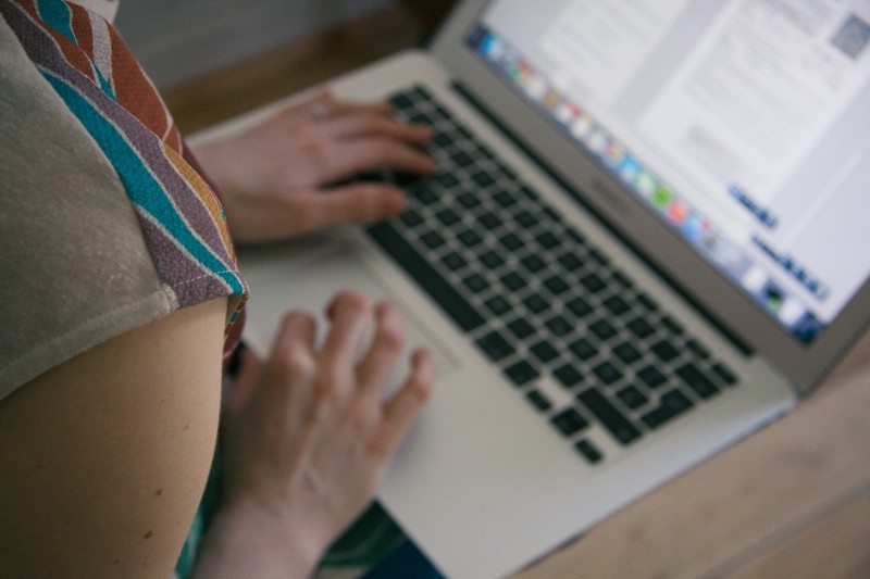 Girl typing on computer