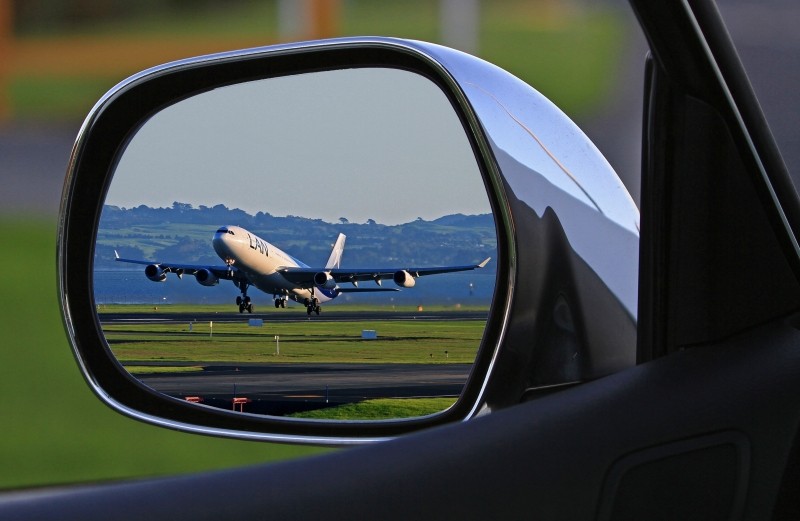 Airplane from wing mirror of car