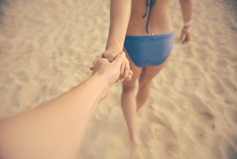 Couple holding hands