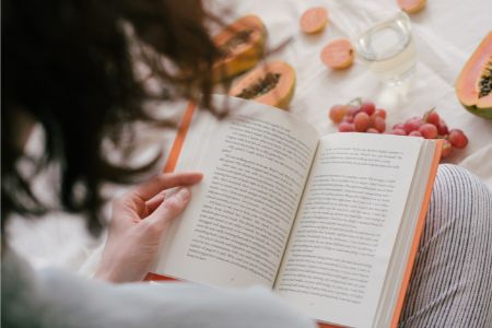 Woman holding book