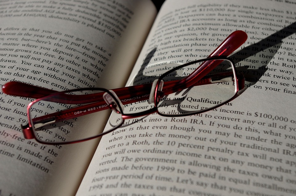 Book with red glasses