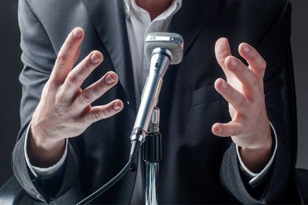 Man in front of microphone