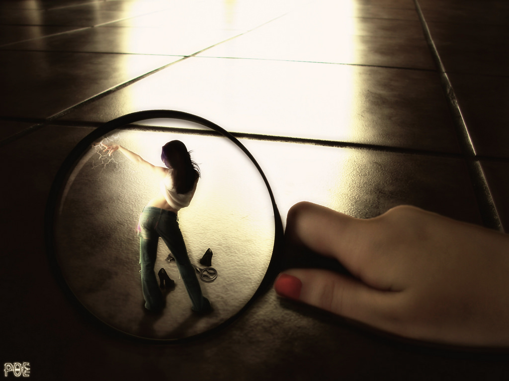 Girl in magnifying glass