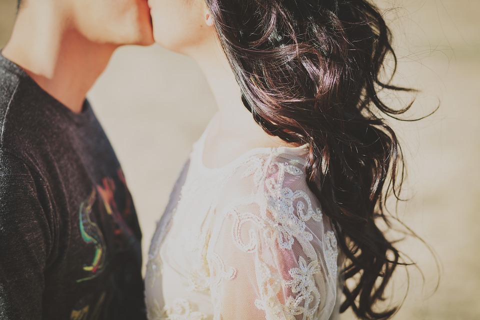 Couple kissing lace dress