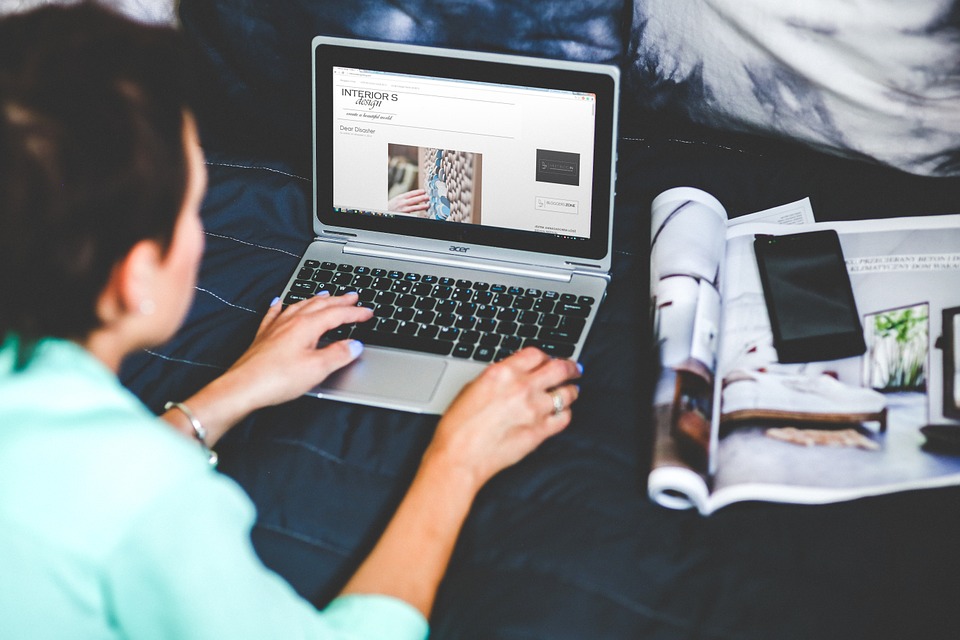 Girl typing on laptop