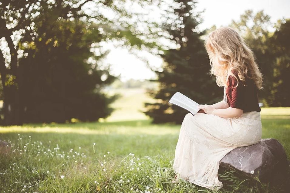 Girl reading in park