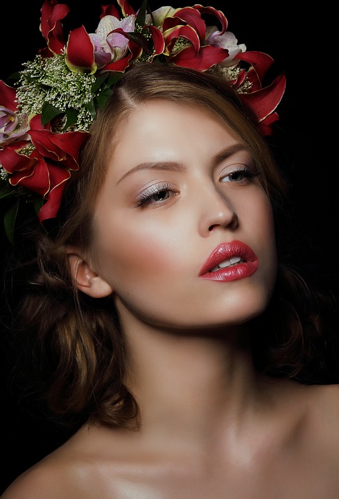 Beautiful woman with flowers in hair