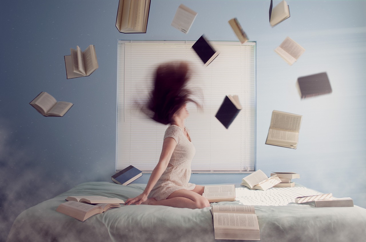Girl with lots of books