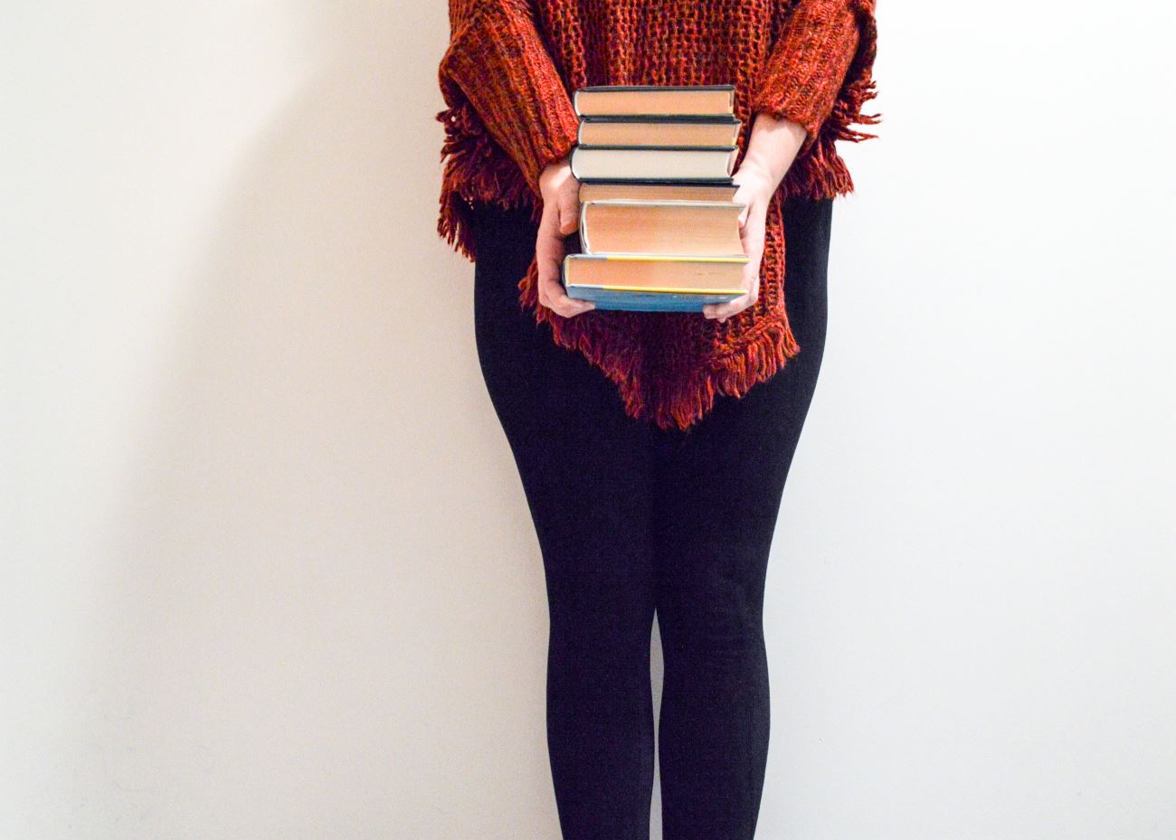 Woman holding books