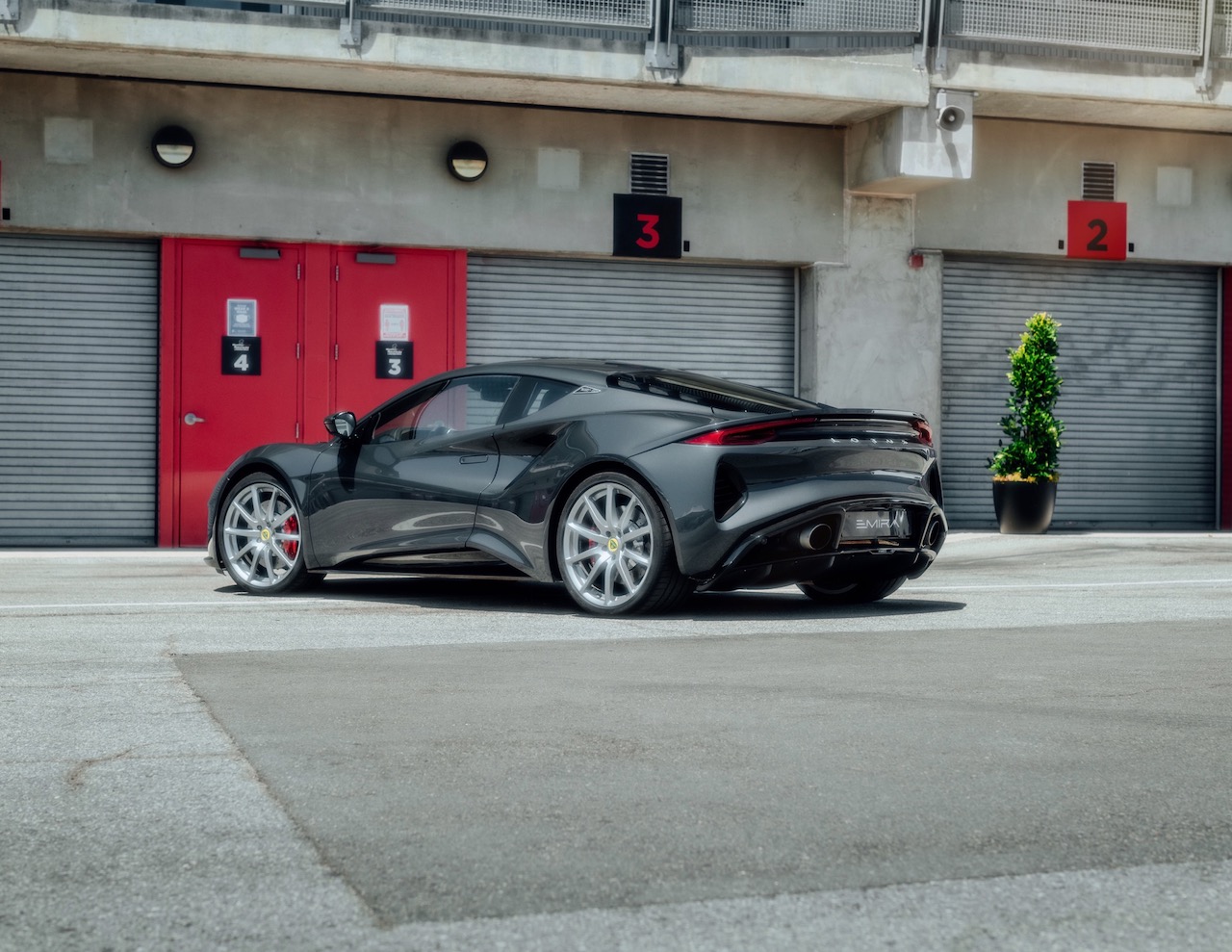 Jensen Button drives the new Lotus Emira at Laguna Seca