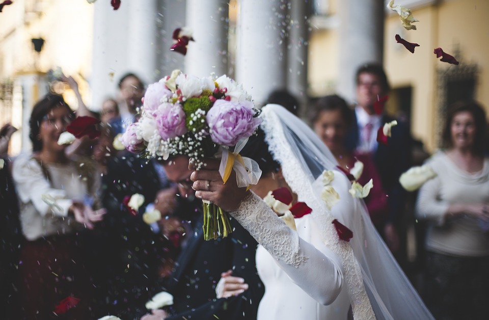 Couple with wedding bouquet