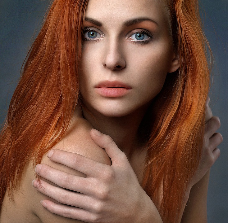 Beautiful woman with red hair redhead