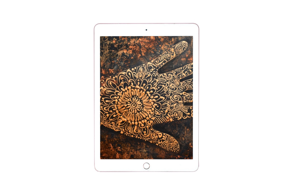 Exquisite Henna Hand iPad Wallpaper with intricate henna motif in warm amber and umber