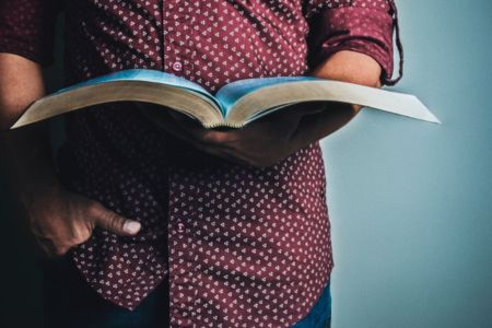 man holding a Bible, Northwest Church Leadership