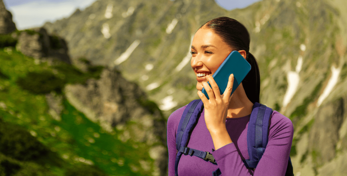lady on the mountains talking on the phone
