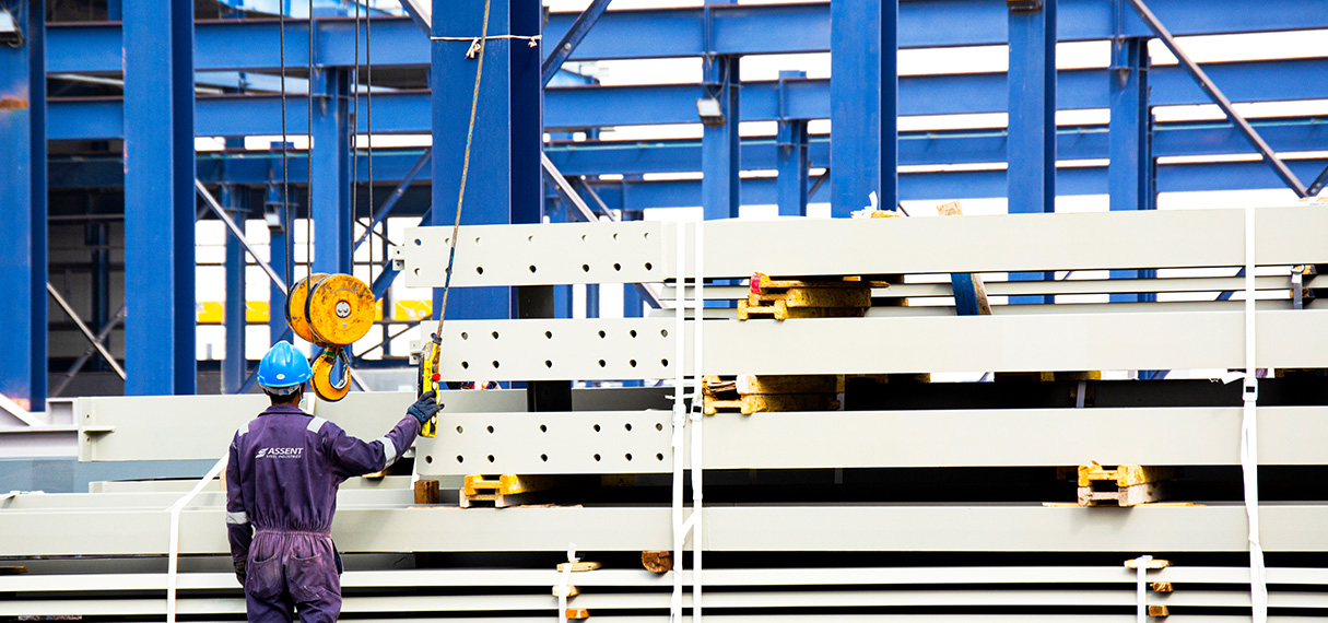 Structural steel building frame assembled on construction site