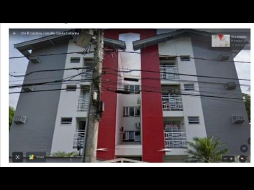 LOTE 001        A unidade autônoma composta pelo apartamen...