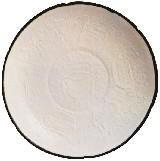 Ding Kiln White Porcelain Dish with Molded Pattern, Northern Song dynasty. Palace Museum, Taipei.
