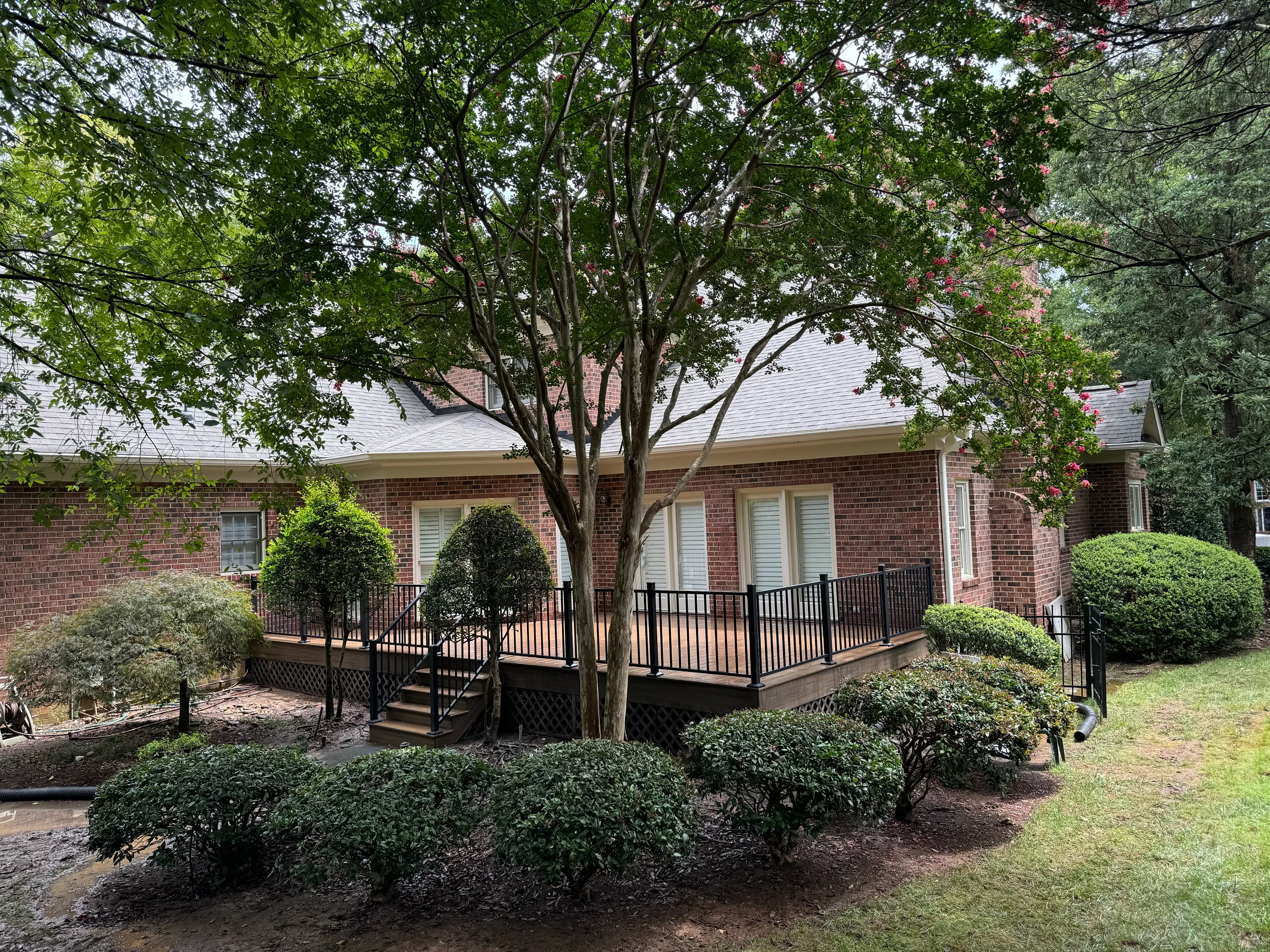 Compass Contracting Project Photo - Composite Deck with Nice Landscaping