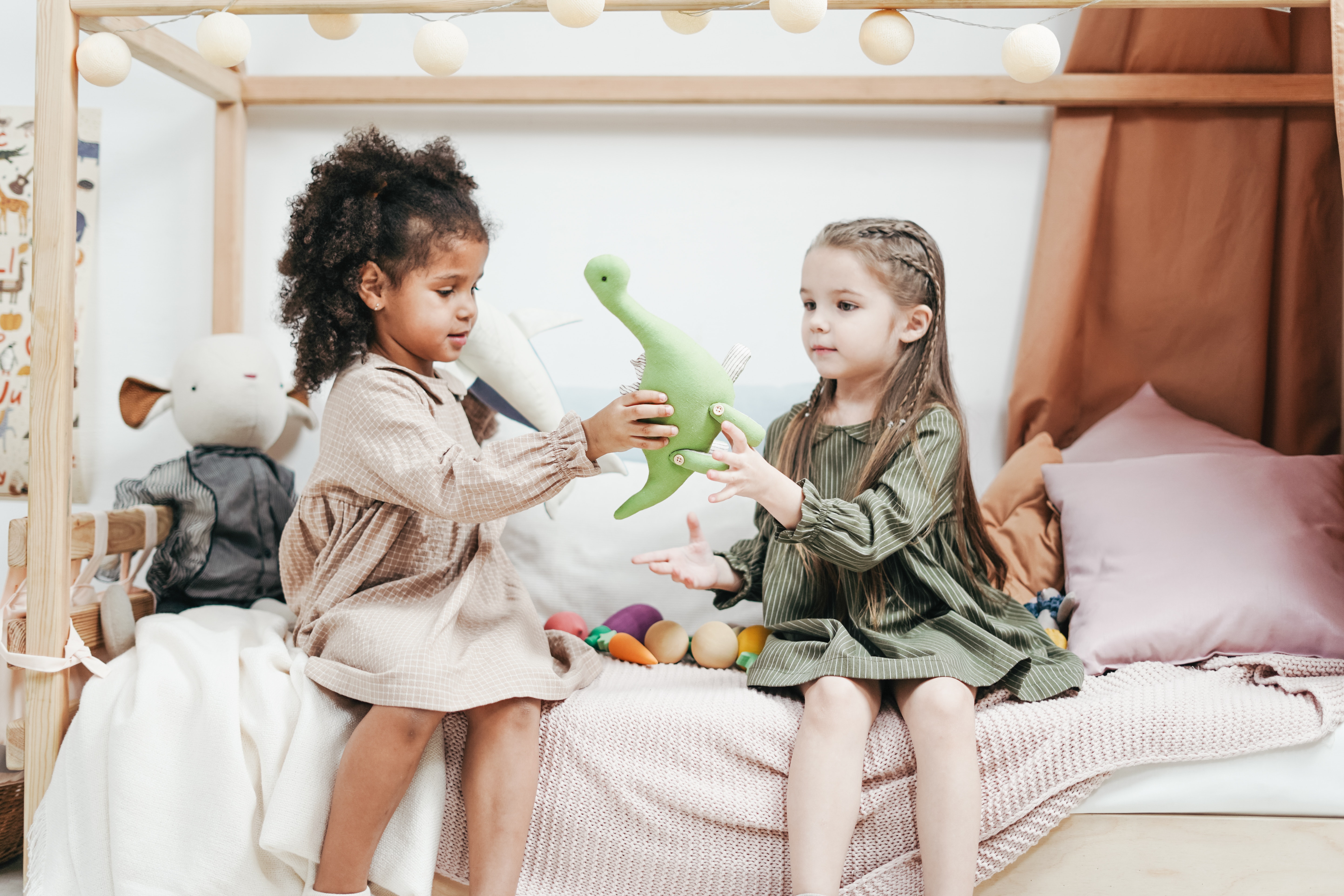 little girls sharing, giving, generosity