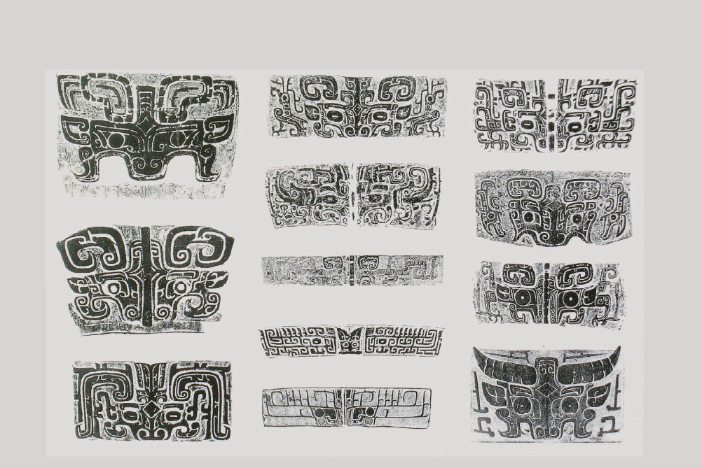 Zoomorphic mask patterns on Shang and Zhou bronzes. Identified variously as bull, goat, or tiger by scholars.