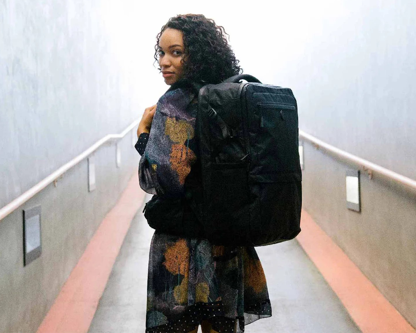 girl travelling with a backpack