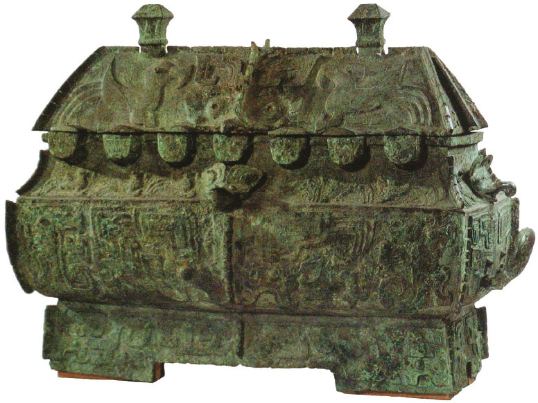Bronze Square Container with Cover (Yi). Late Shang dynasty. 71 kg. National Museum of China, Beijing. Designed in the form of a miniature palace.