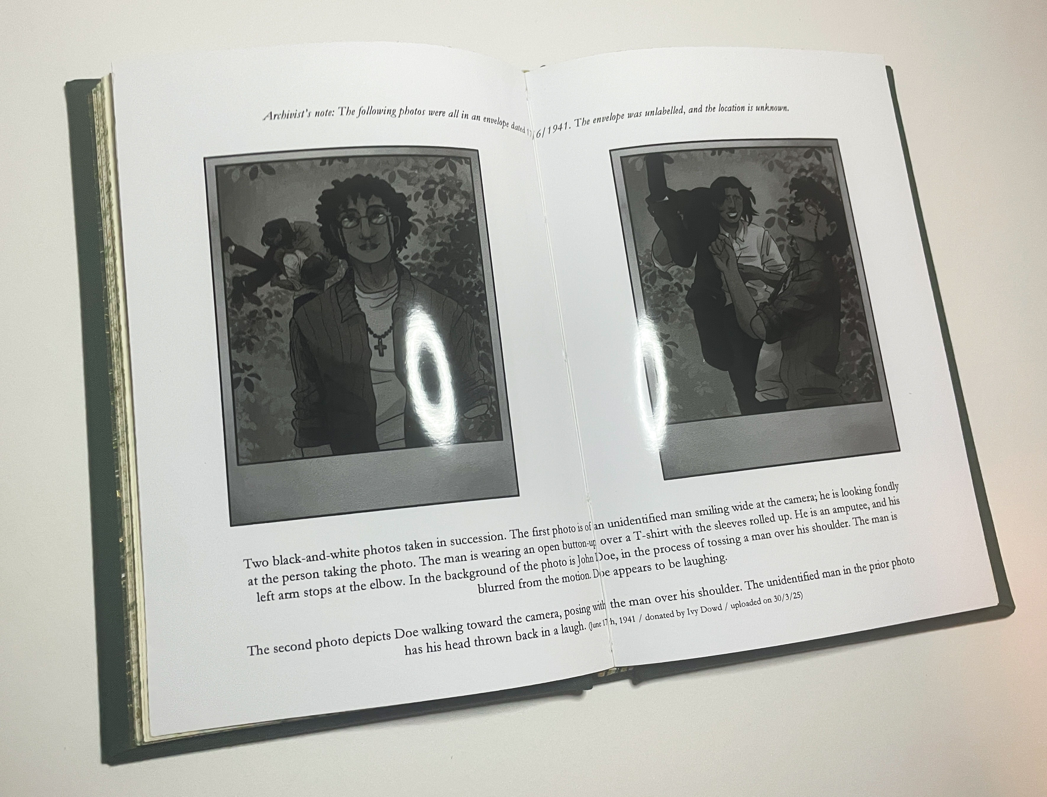 A two-page glossy spread of black-and-white digital artwork that has been made to look like poloroid photographs. The leftmost image shows Oscar smiling at the camera while John throws Arthur over his shoulder in the background. The rightmost image shows John, with Arthur still over his shoulder, grinning at Oscar, who has his head thrown back in laughter. A description of the photographs is printed beneath them.