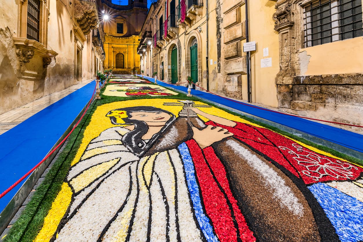 Street art made with flowers at the Infiorata Flower Festival, Noto