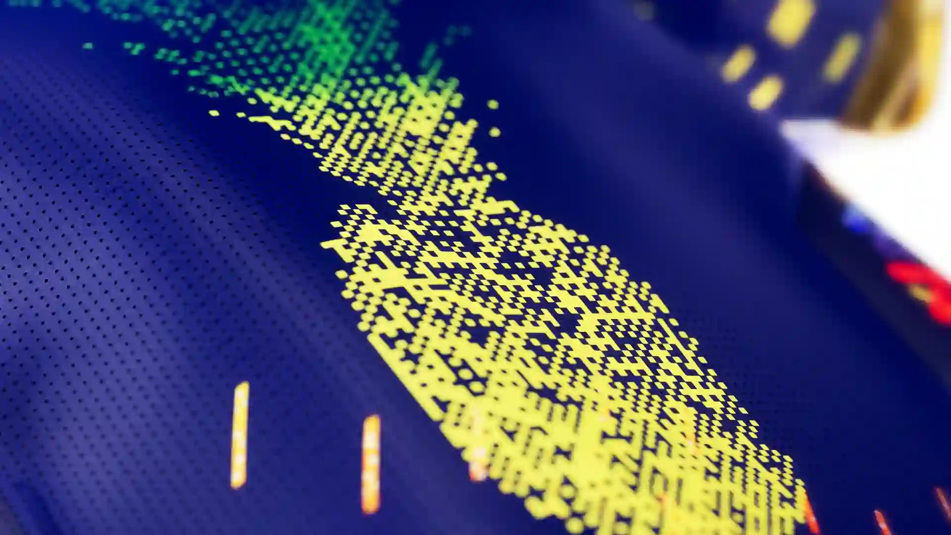 Close up 3D rendered perforated navy blue surface with a yellow green dot matrix pattern resembling a data visualization or textile detail
